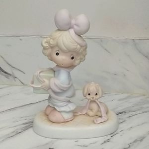 Precious Moments figurine.